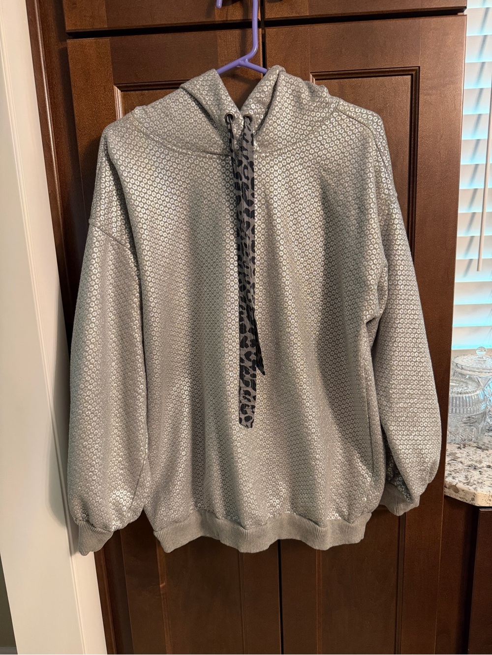 Pilcro Foiled Sequin Hooded
Sweatshirt